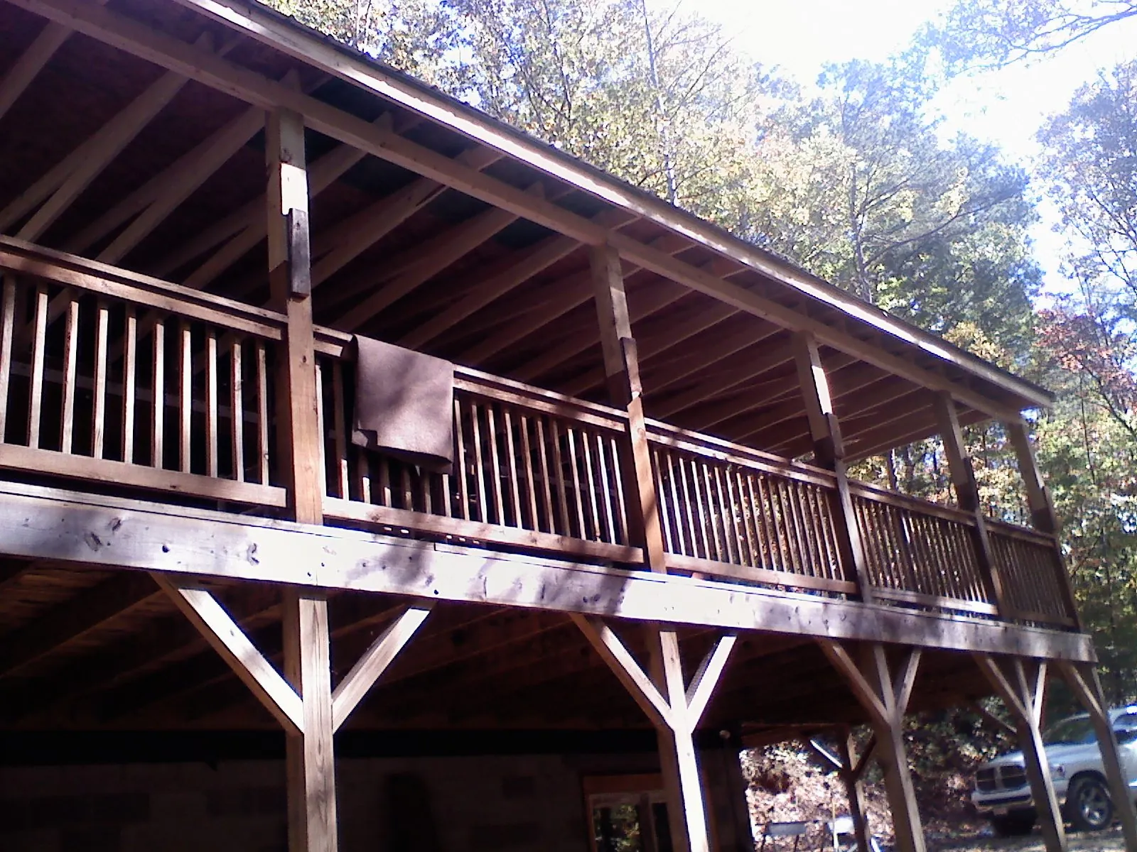 Timber framing under a new elevated porch and deck — Roof Leak Repair in Palmer by Roofing Brothers